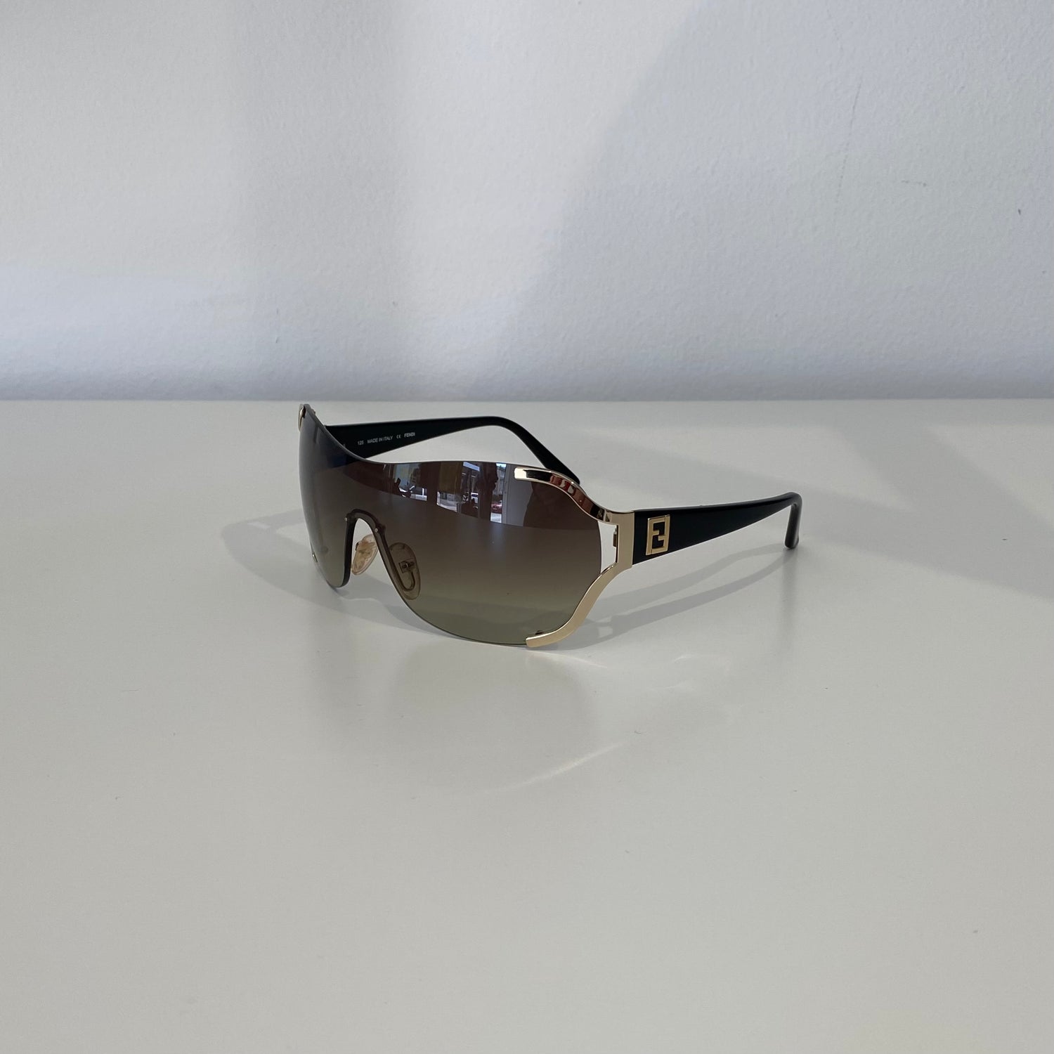 Pre-Loved Fendi Sunglasses- Black and Gold